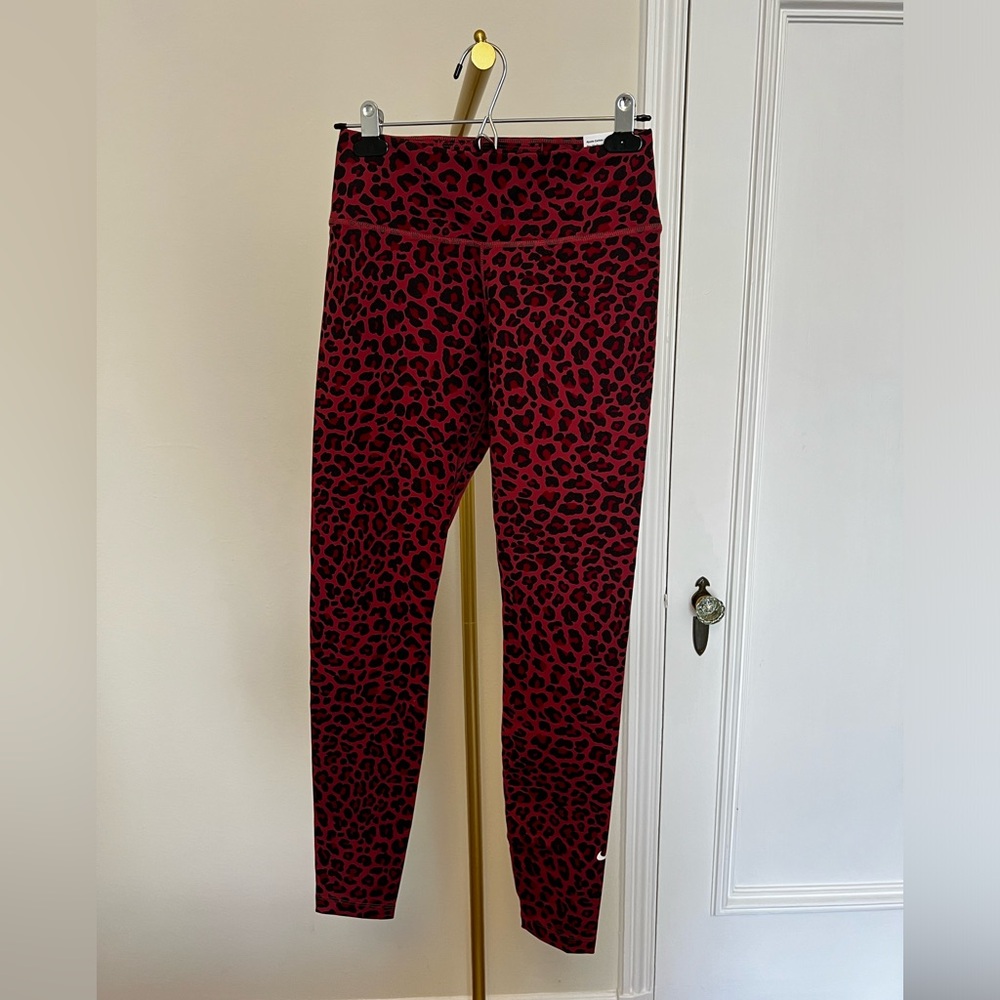Nwt red nike leopard leggings. Small